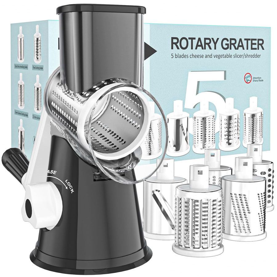Rotary cheese and vegetable grater that attaches to countertop with suction