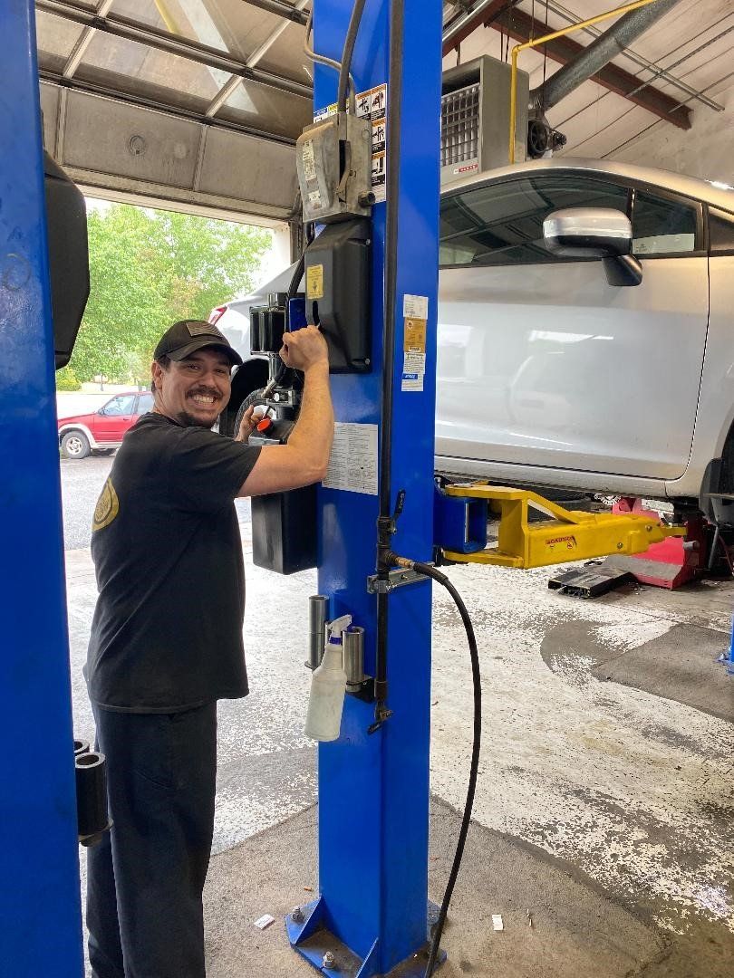 Mechanic While Working — Chester, VA — Heveners Tire & Auto