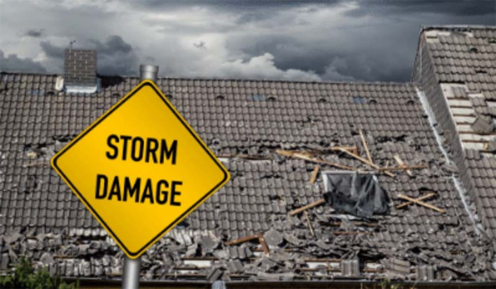 A yellow sign that says `` storm damage '' is in front of a damaged roof.