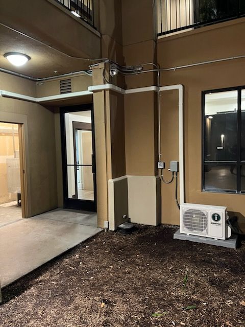 The outside of a building with a lg air conditioner