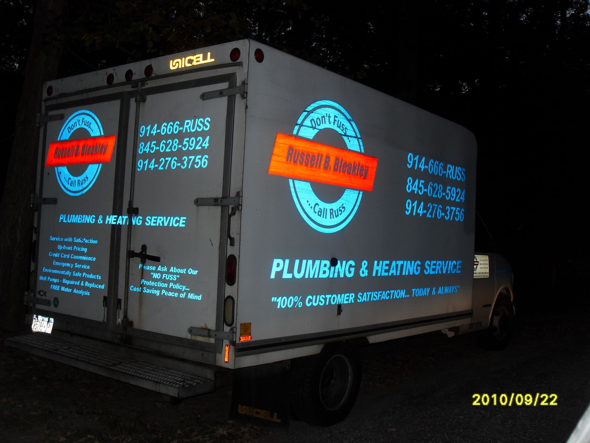Bleakley Plumbing & Heating Service truck with contact info and slogan: 