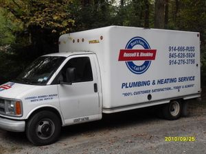 White plumbing service truck with 