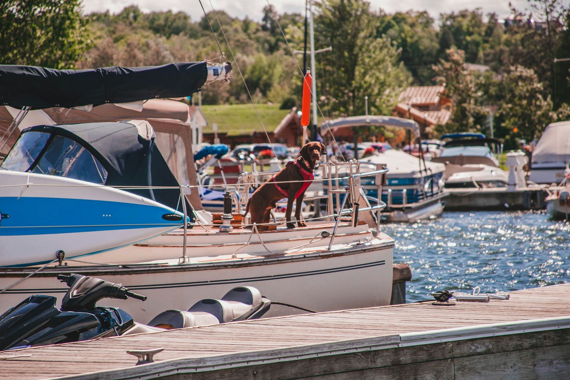 A boat is floating on top of a large body of water.
