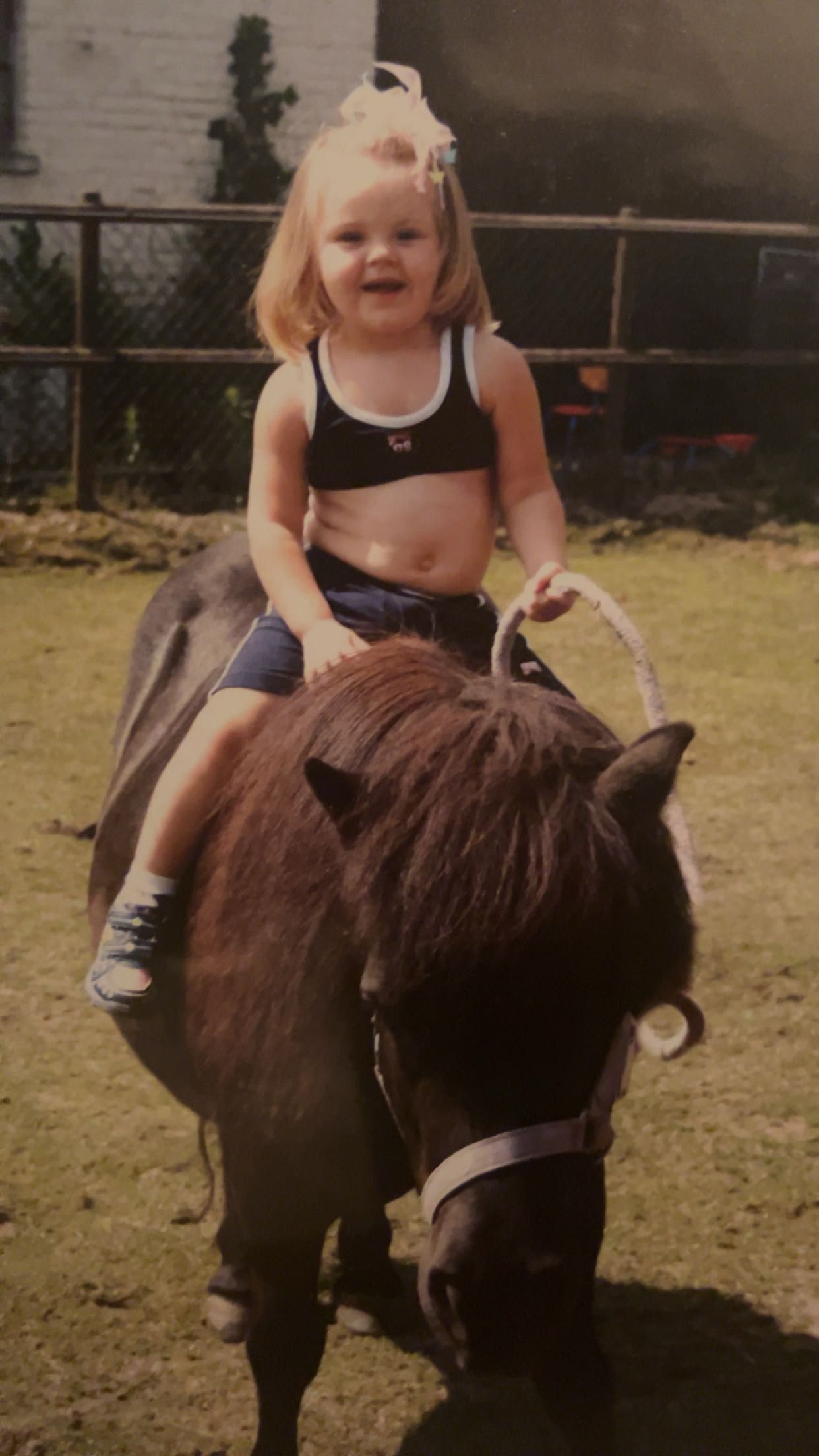 A black and white photo of a group of people posing for a picture.