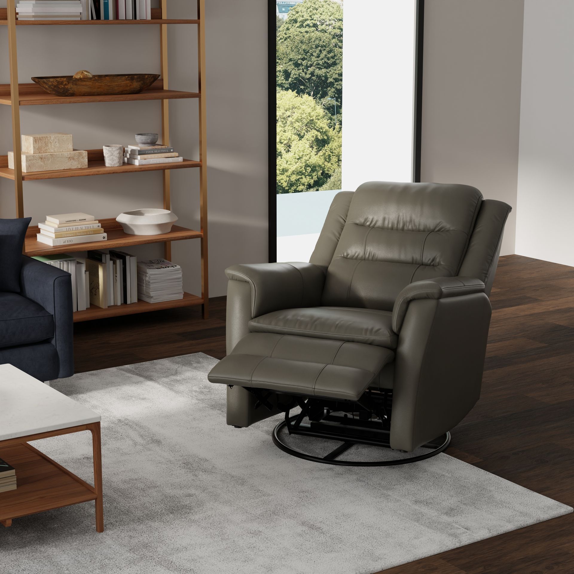 A gray leather recliner with a footrest extended, placed on a light rug in a modern living room with wooden shelving.