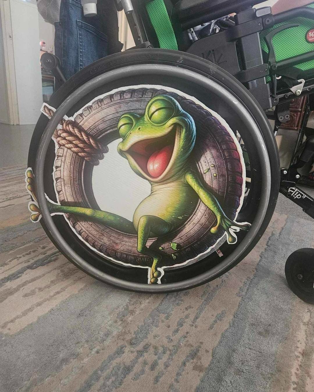 Wheelchair Wheel With a Cartoon Frog Bursting From a Tire, Laughing — That Printed Vinyl Place in Heatley, QLD