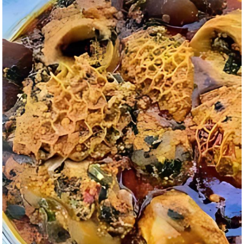 A close up of a plate of food with a lot of different types of food on it.