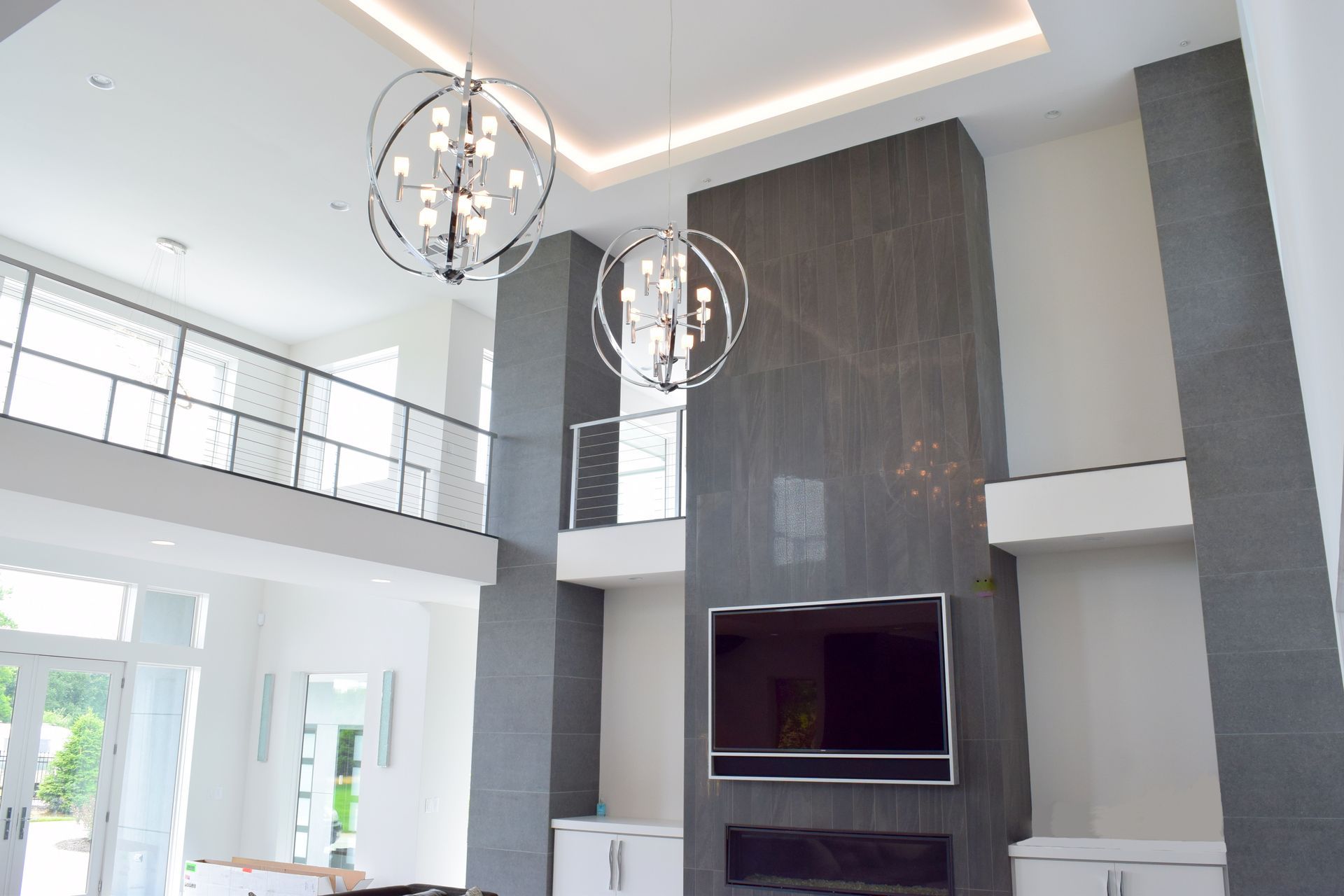 A Living Room With A Fireplace - Carmel, IN - Goldberg Design Group