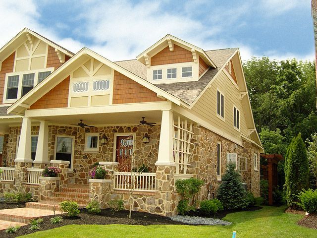 A Large House With A Large Porch And A Lot Of Windows - Carmel, IN - Goldberg Design Group