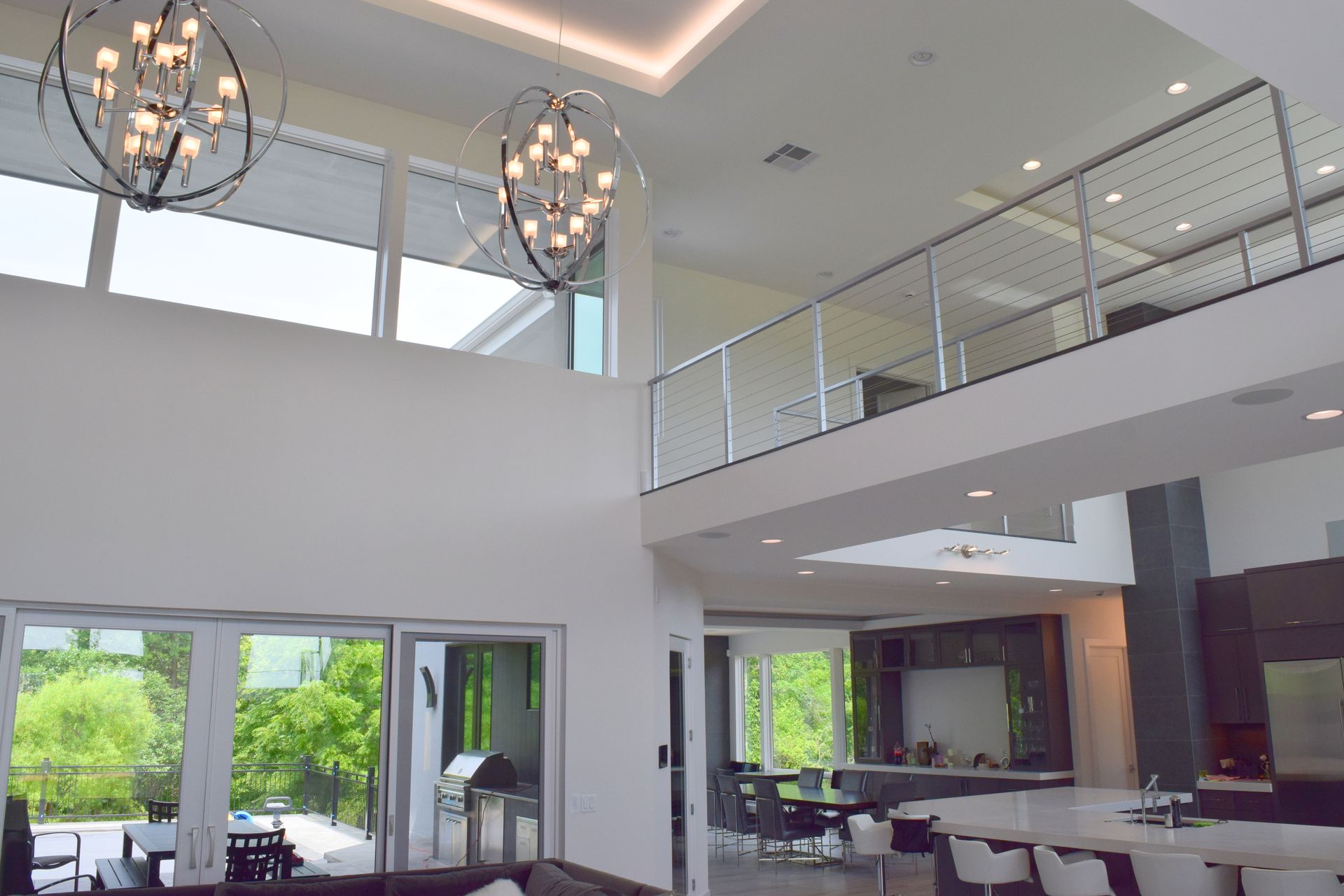 A Living Room With A Balcony - Carmel, IN - Goldberg Design Group
