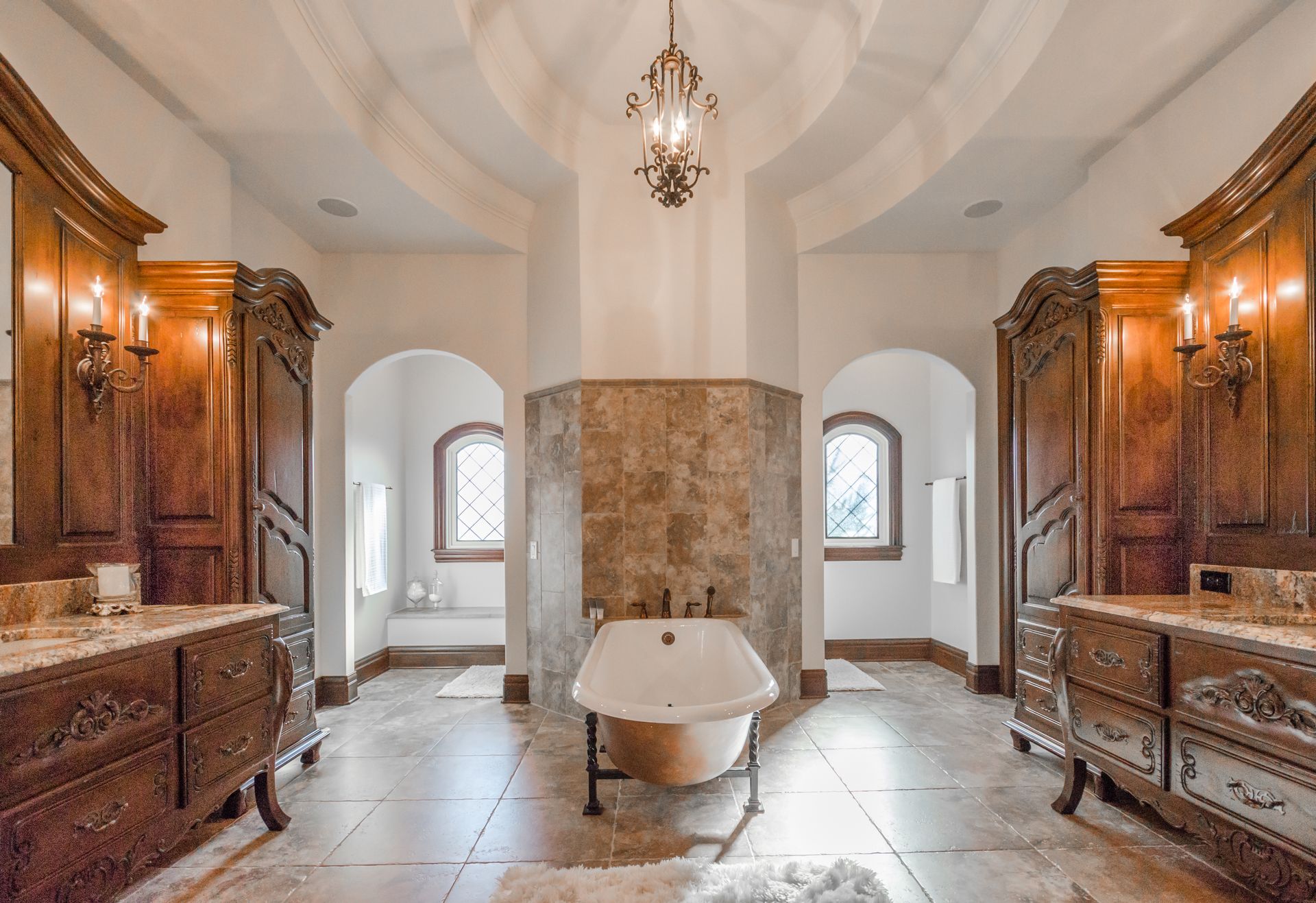 A Large Bathtub In The Middle Of The Bathroom - Carmel, IN - Goldberg Design Group