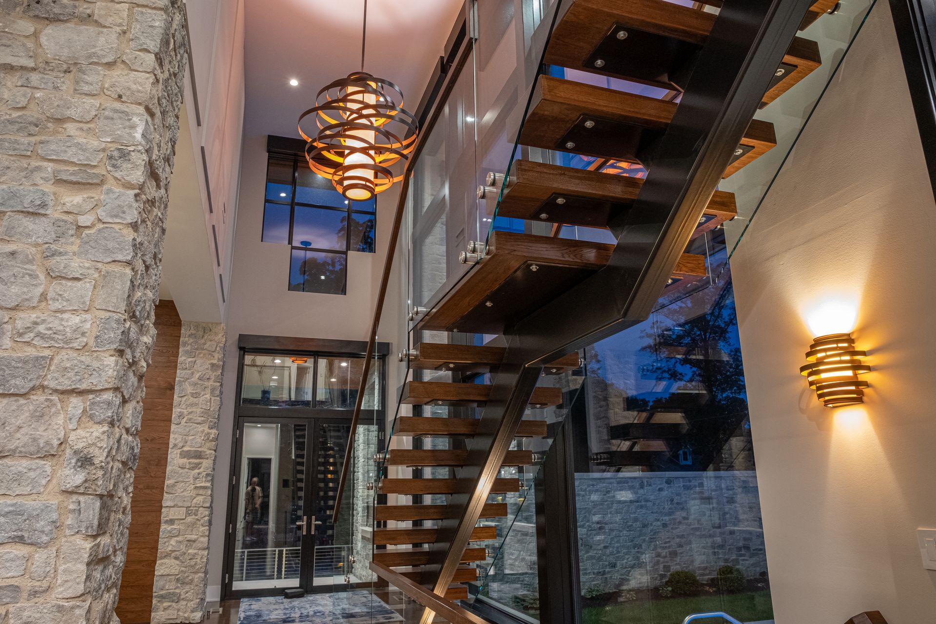 A House With A Wooden Staircase - Carmel, IN - Goldberg Design Group
