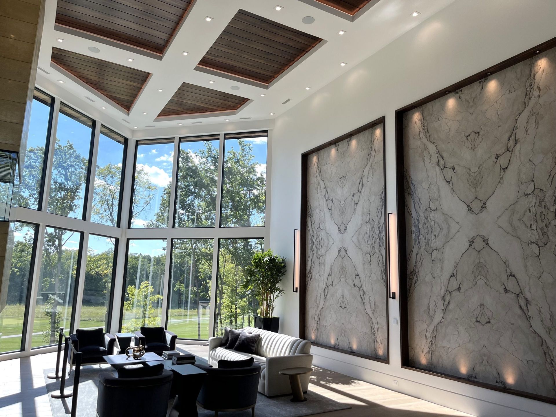 A Living Room With A Lot Of Windows And A Couch - Carmel, IN - Goldberg Design Group