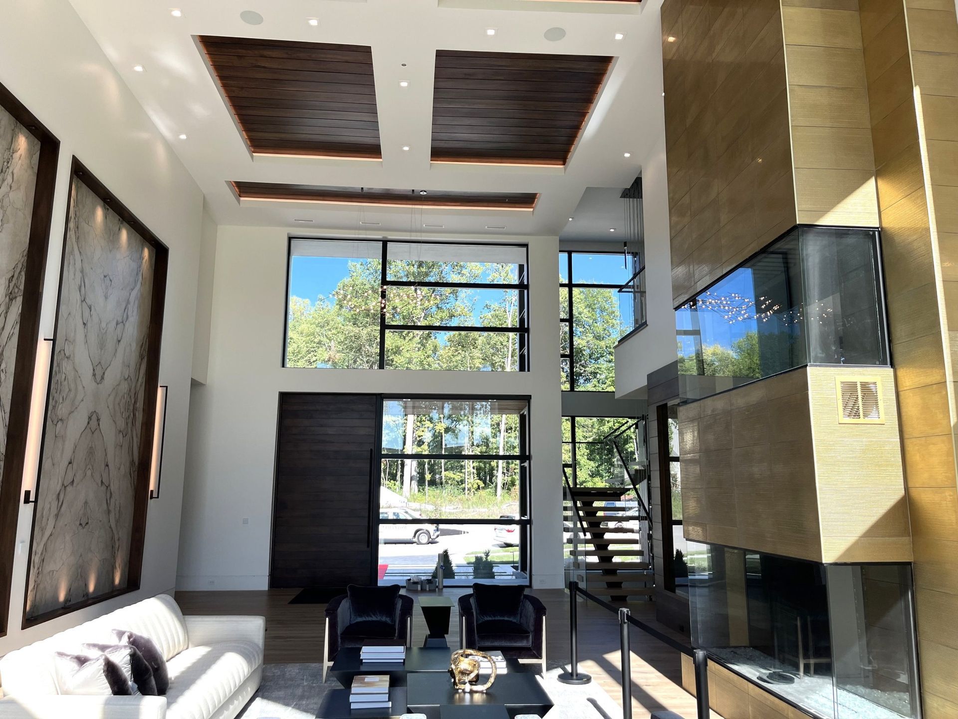 A Living Room With A Couch And A Fireplace - Carmel, IN - Goldberg Design Group