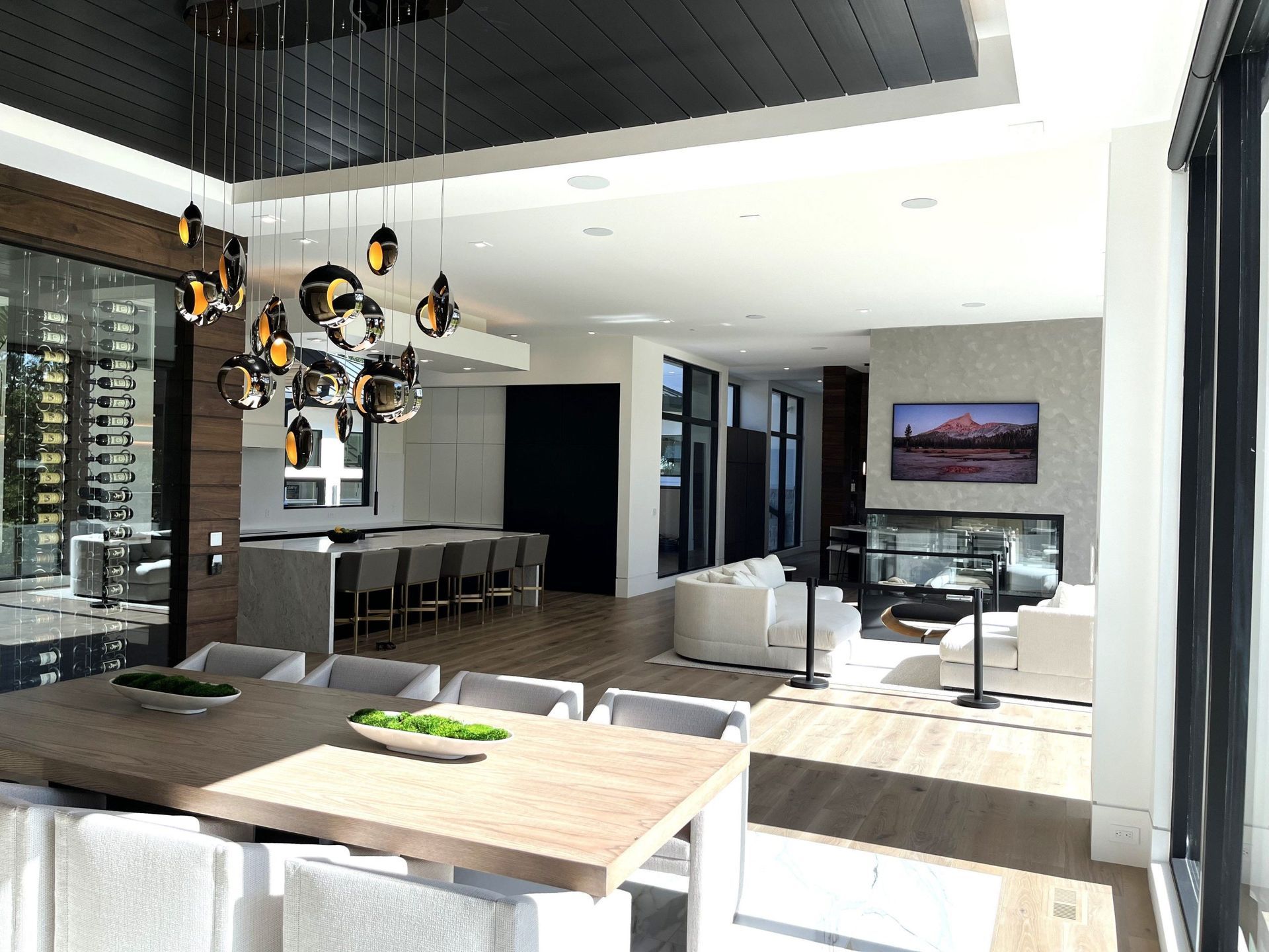 A Living Room With A Table And Chairs - Carmel, IN - Goldberg Design Group