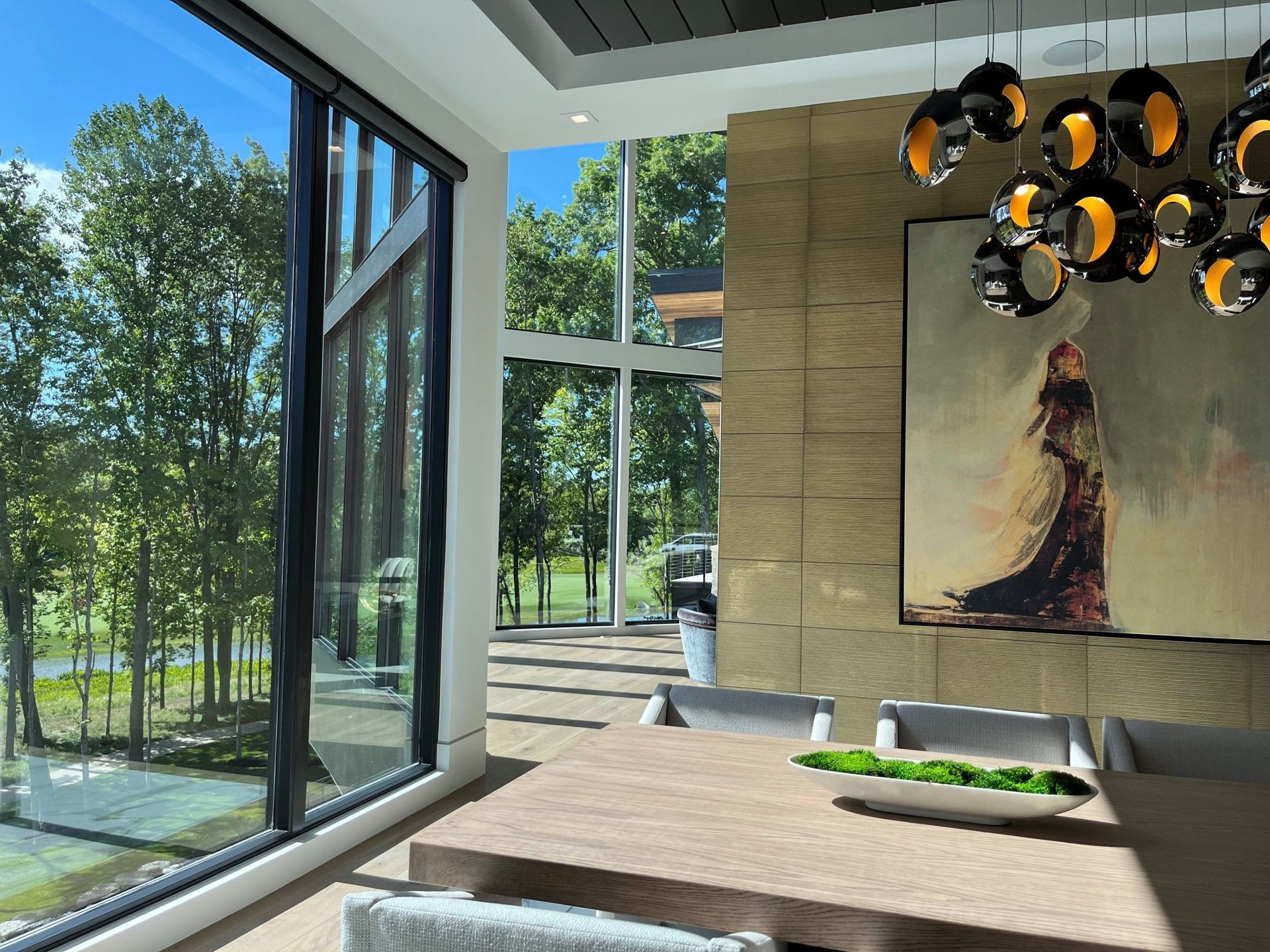 A Dining Room With A Large Painting On The Wall - Carmel, IN - Goldberg Design Group