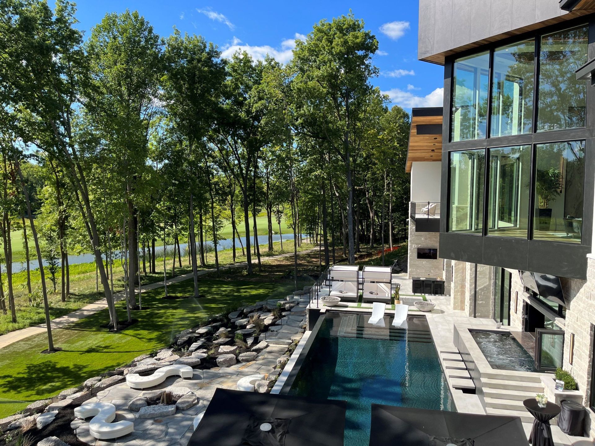 A Large House With A Outdoor Swimming Pool - Carmel, IN - Goldberg Design Group