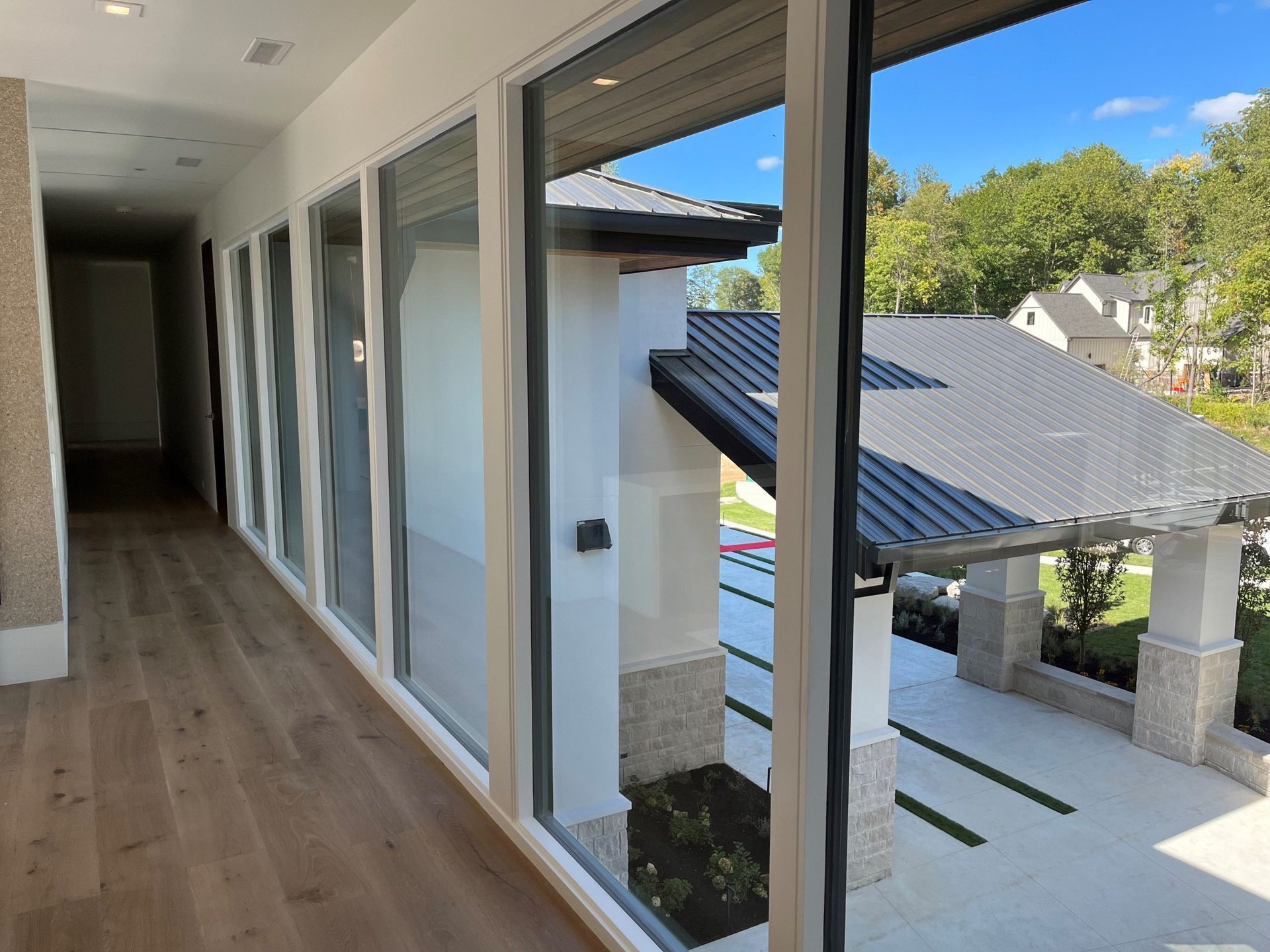 A Hallway Leading To A Balcony - Carmel, IN - Goldberg Design Group