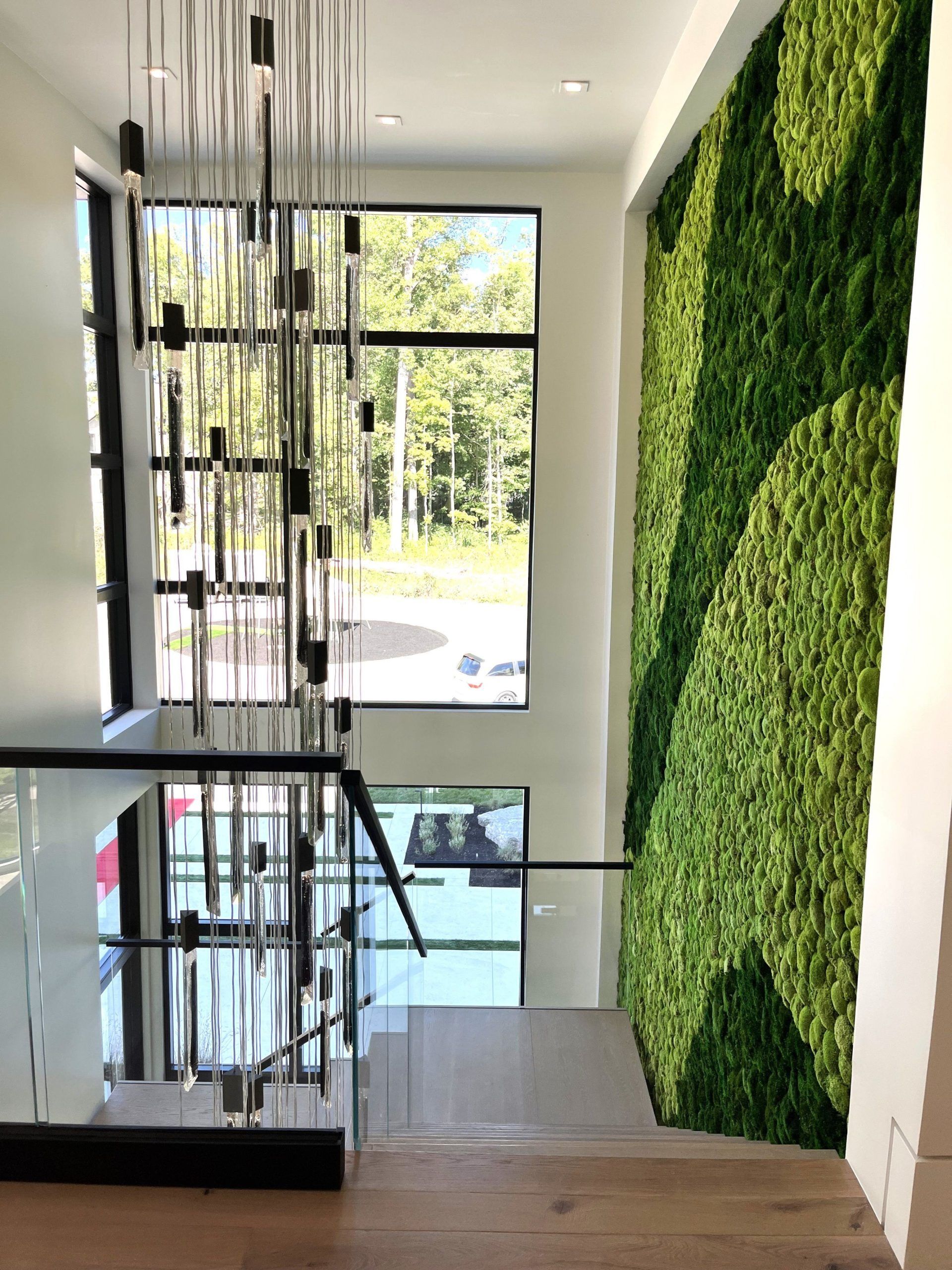A Staircase With A Green Wall - Carmel, IN - Goldberg Design Group