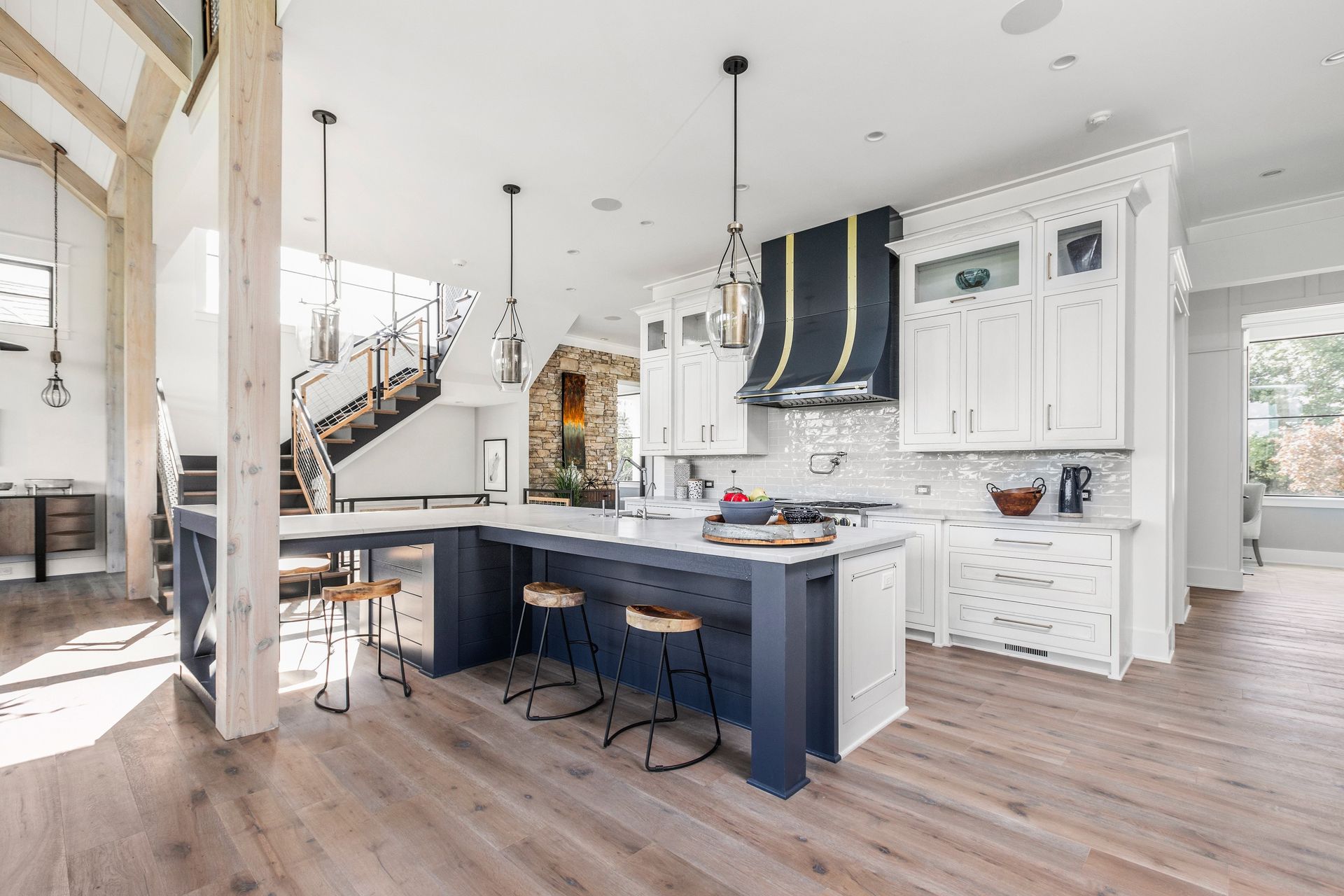 A Large Kitchen With White Cabinets - Carmel, IN - Goldberg Design Group