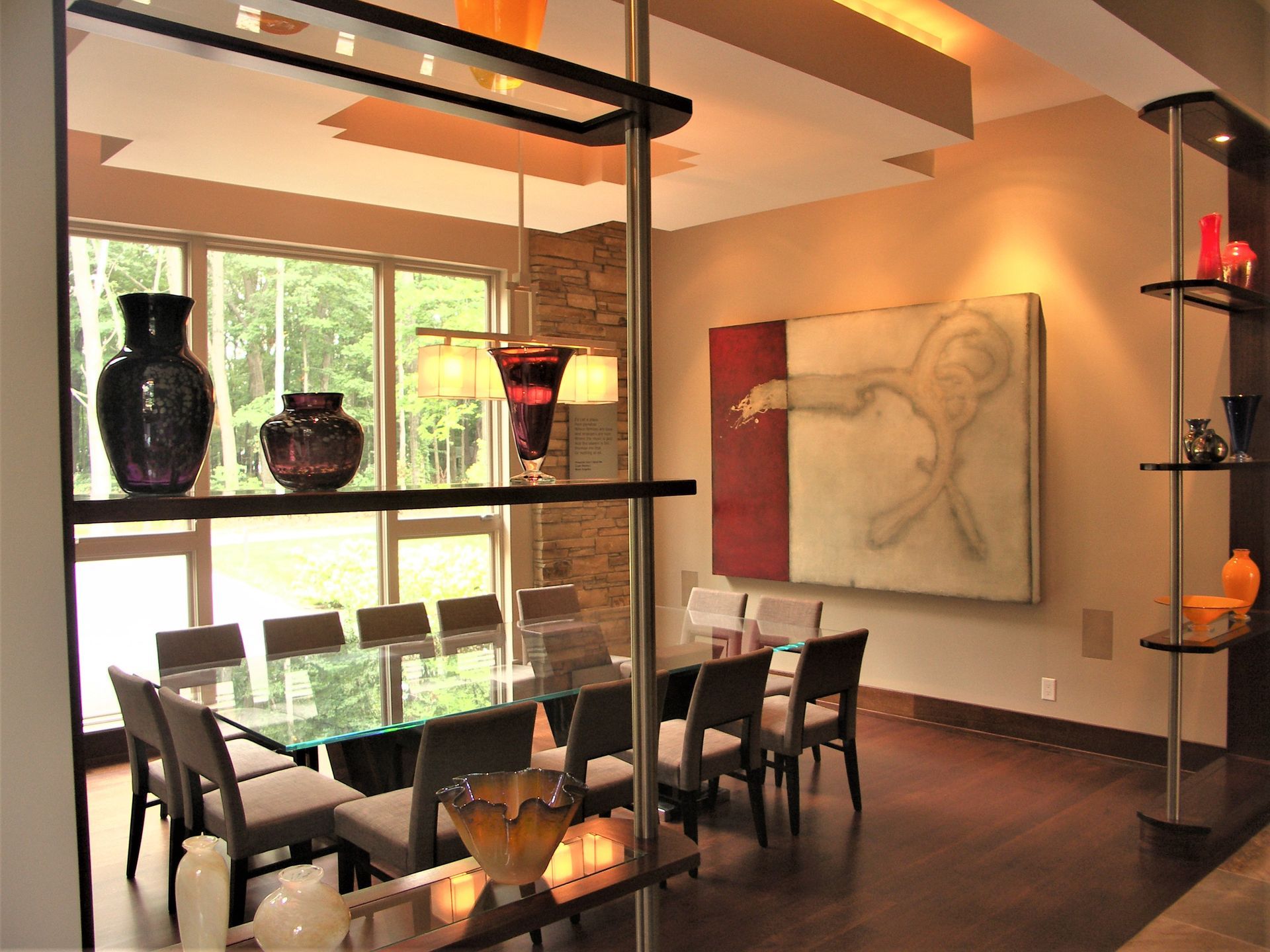 A Dining Room With A Glass Table And Chairs - Carmel, IN - Goldberg Design Group