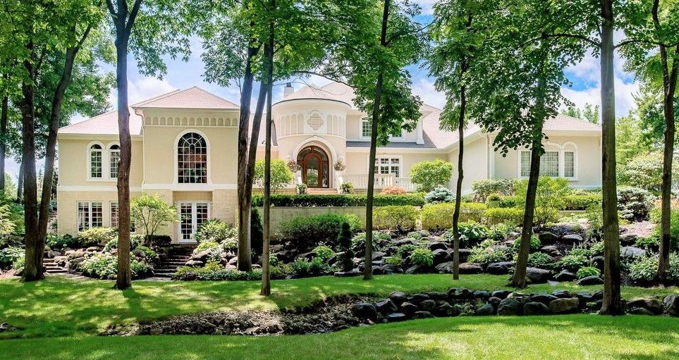 A Large White House Hidden By The Trees - Carmel, IN - Goldberg Design Group