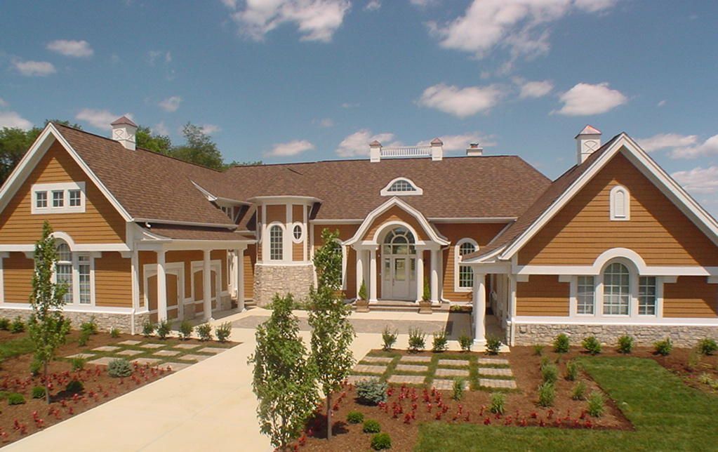 A Large House Shingle With A Brown Roof And White - Carmel, IN - Goldberg Design Group