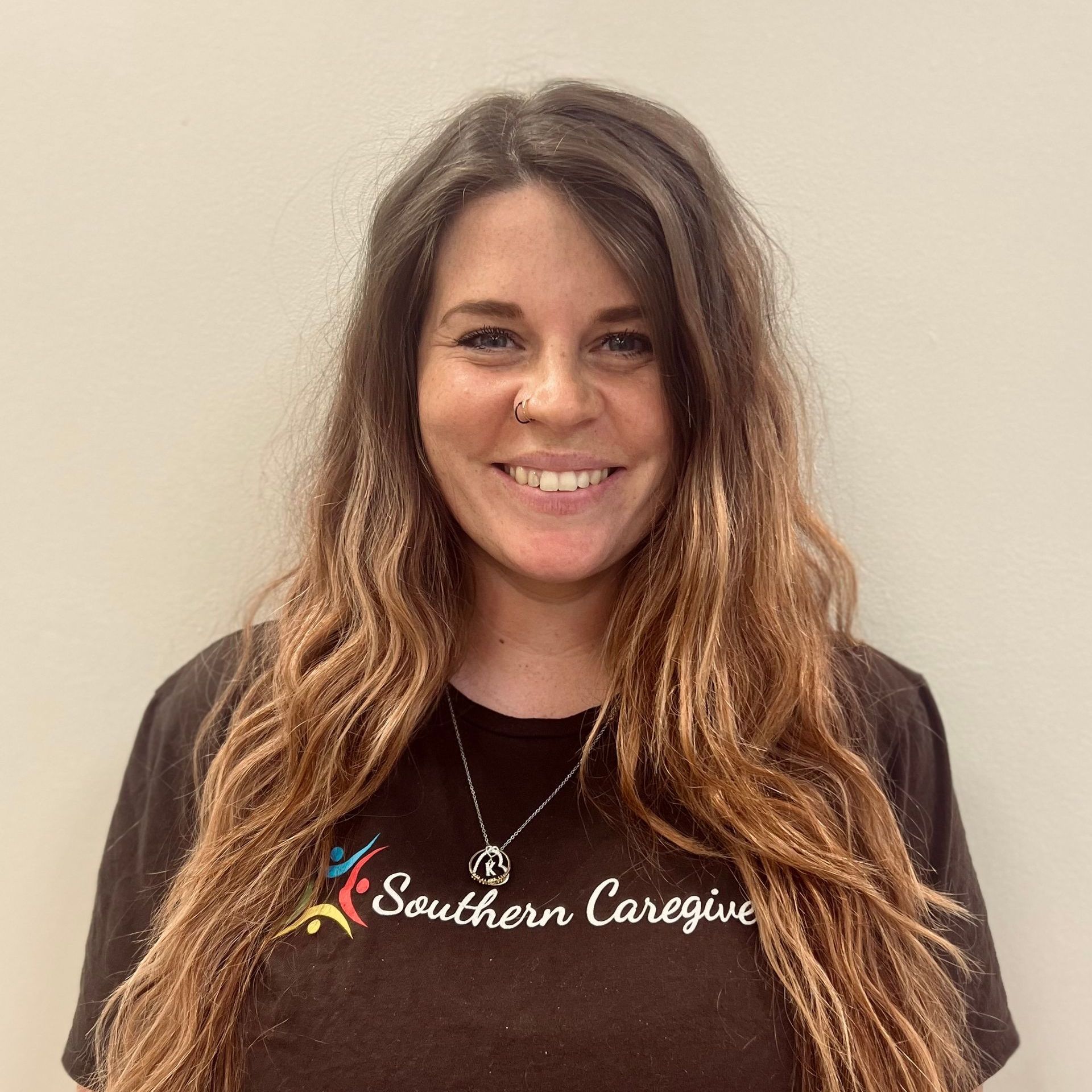 a professional headshot of Jordan Ray