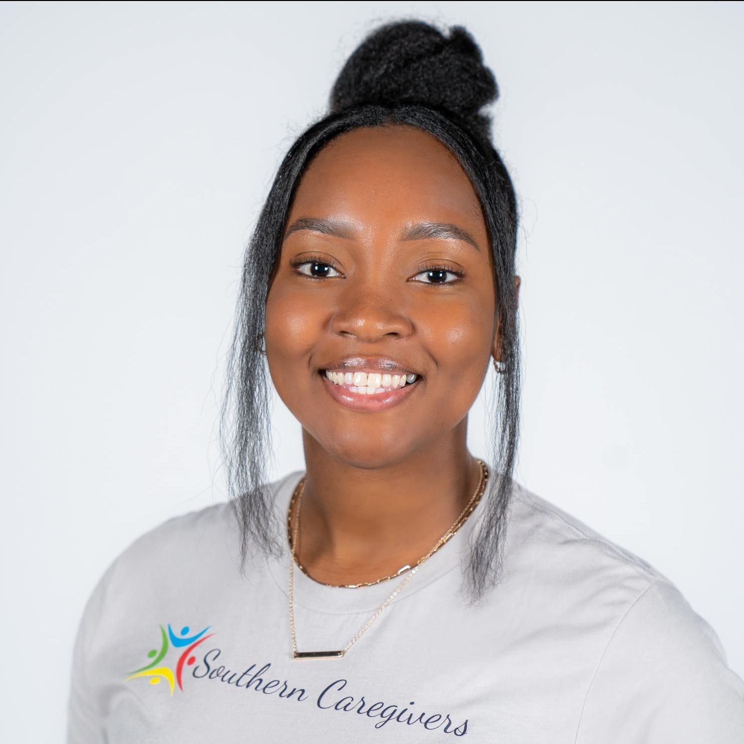 A woman wearing a white shirt that says southern caregivers