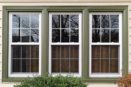 Three Replacement Windows with Green Trim — North Webster, IN — Lake City Builders II LLC