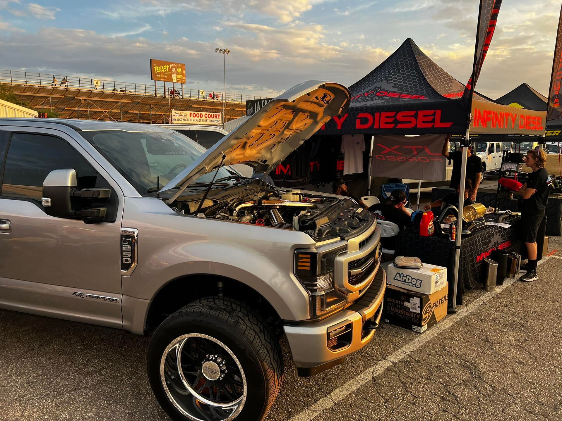 man repairing diesel engine