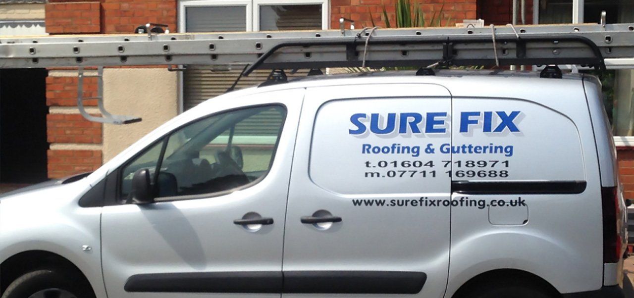 Surefix Roofing company van
