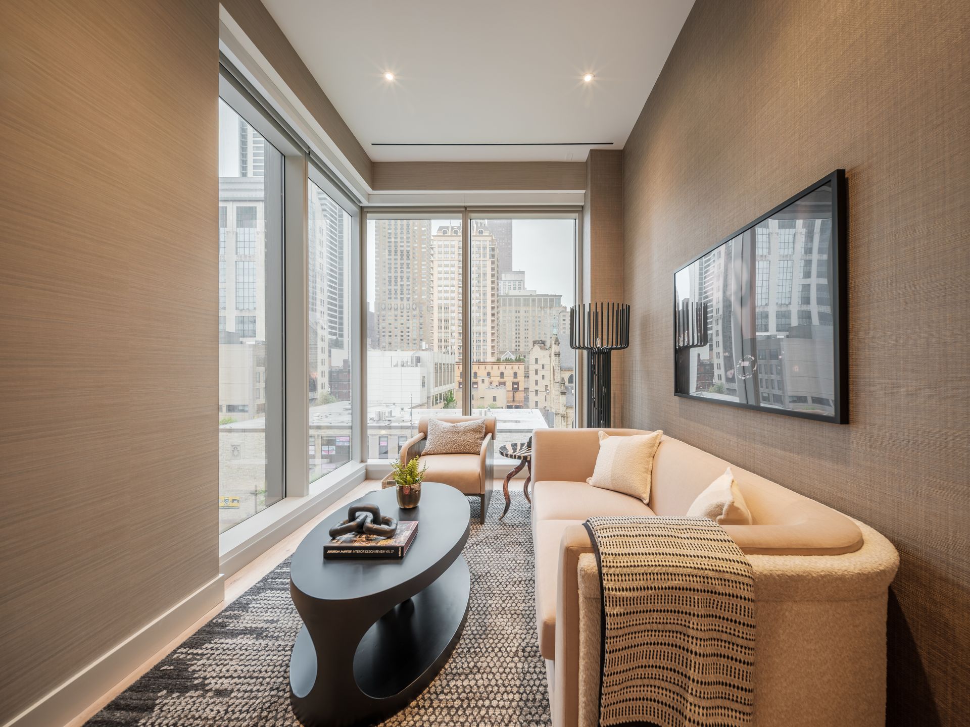 A living room with a couch and a coffee table