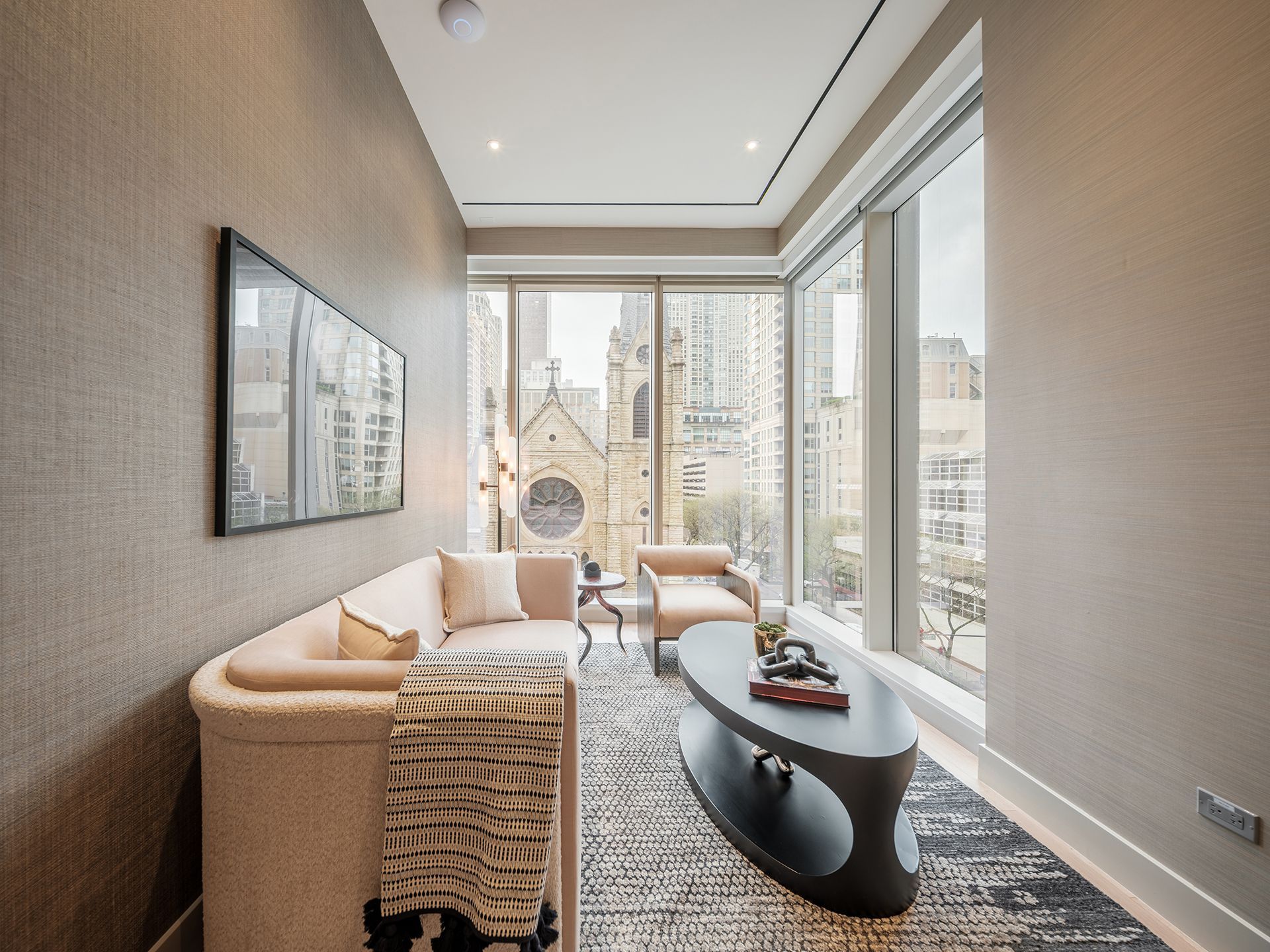 A living room with a couch and a coffee table