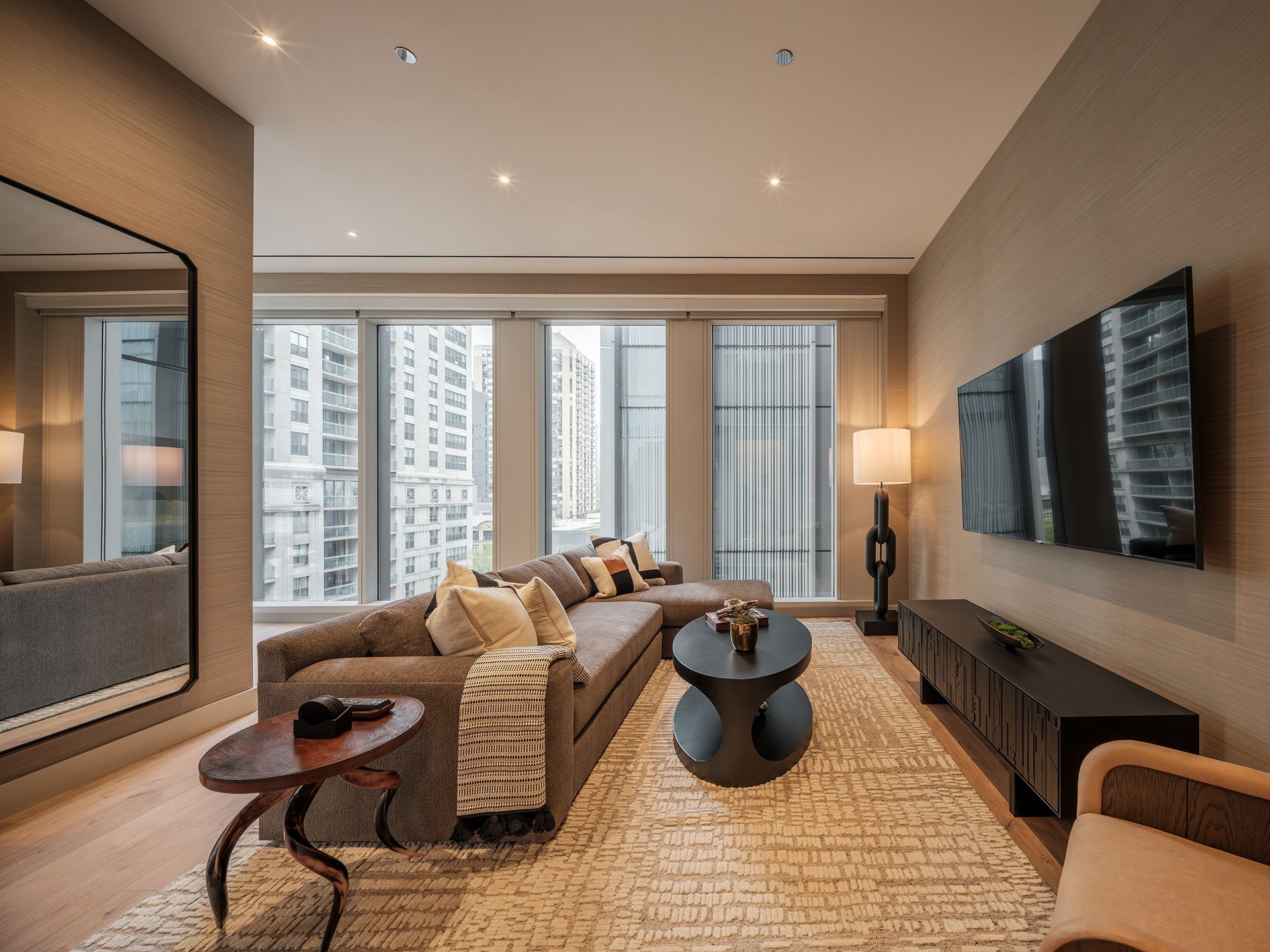A living room with a couch and a flat screen tv