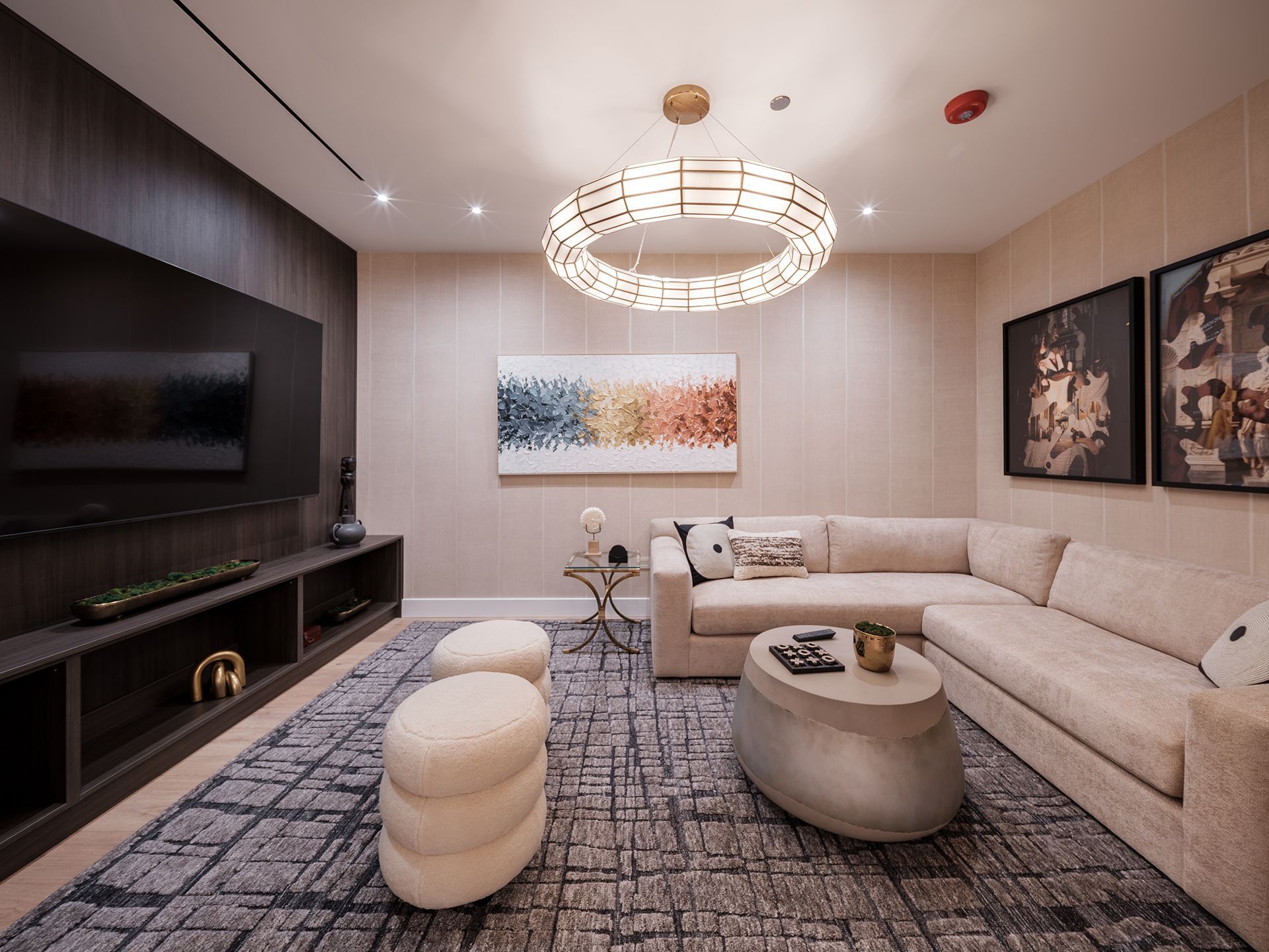 A living room with a couch , table , and television.