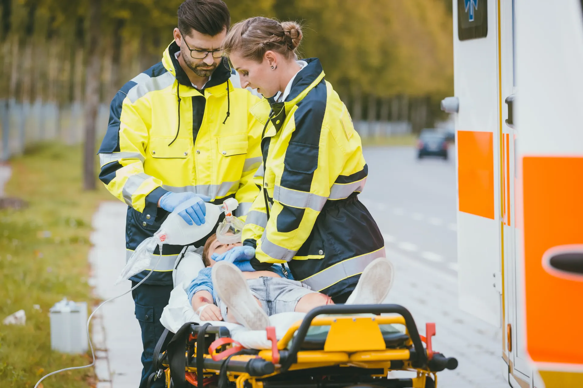 Child being transported into ambulance