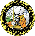 The seal of the county of placer in california with a train on the tracks.