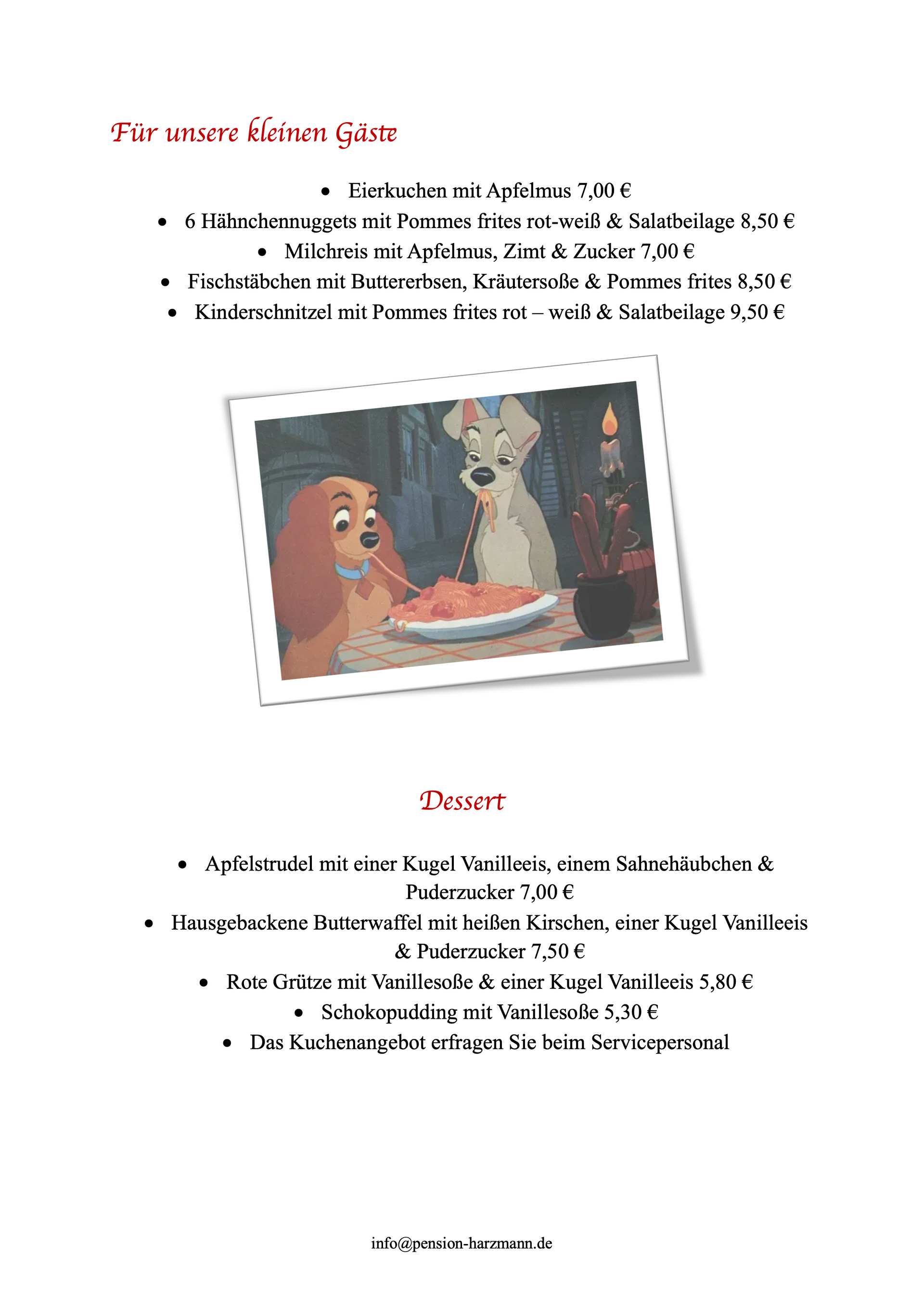 Ein Bild von zwei Hunden, die mit einem Teller Essen an einem Tisch sitzen.