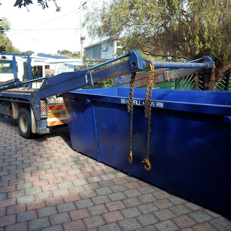Truck Delivering A Empty Waste Skip — Suncoast Skips in Coolum Beach, QLD