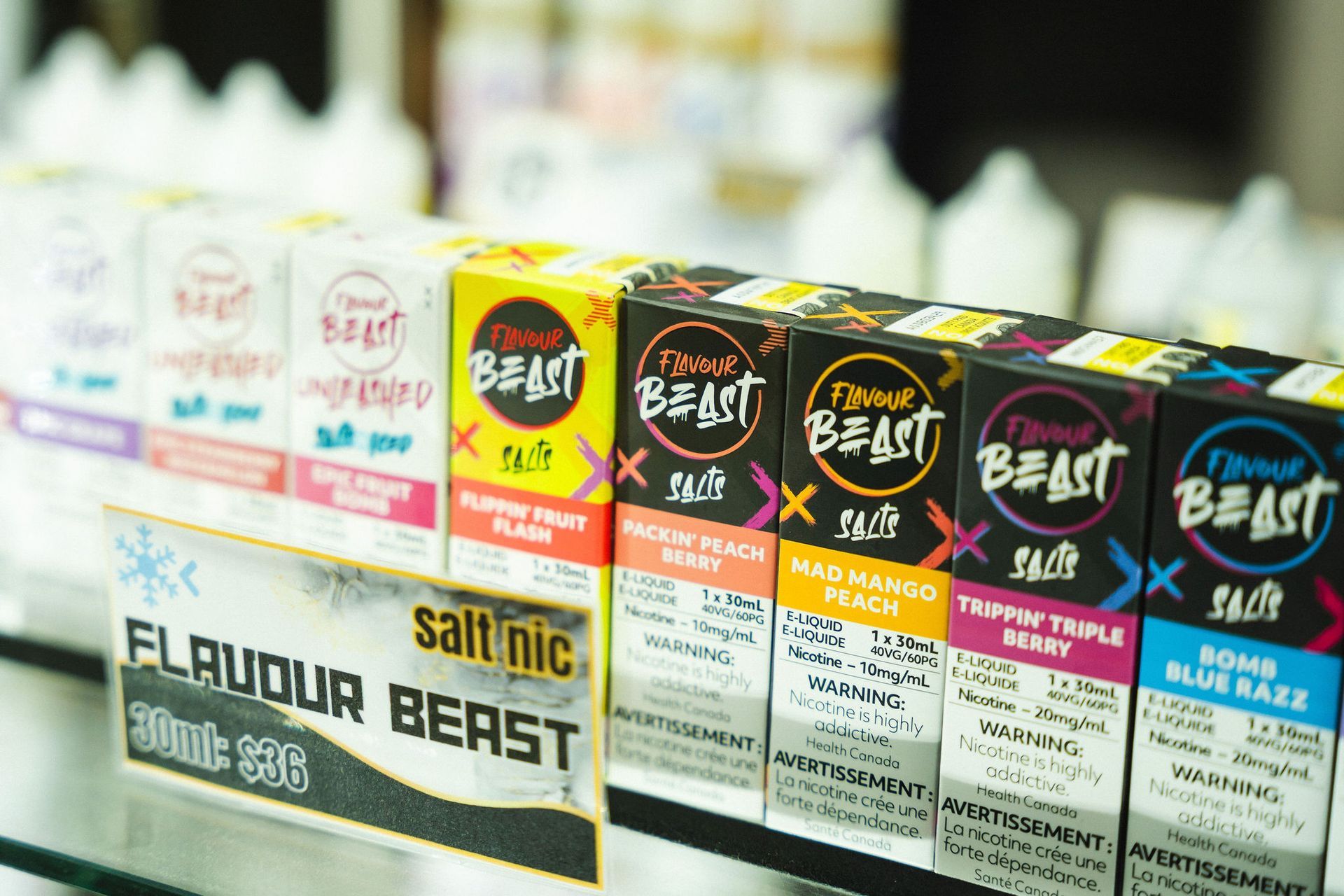 A man and a woman are standing next to each other in a room.