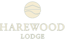A logo for harewood lodge with a ball in the middle