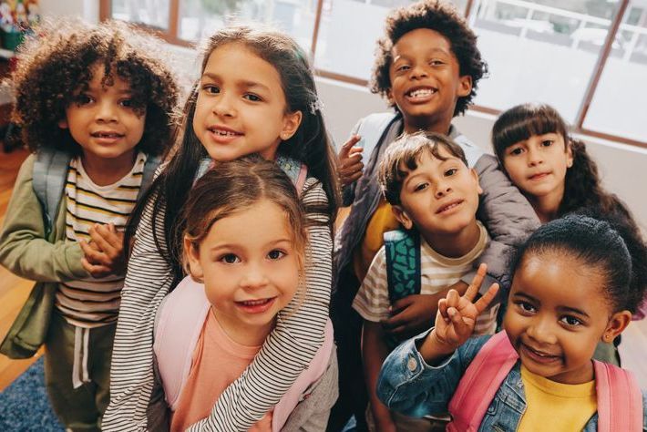 Class selfie in an elementary school. Kids taking a picture together in a co-ed school 