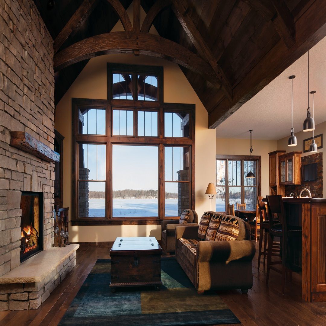 A living room with a fireplace and a couch