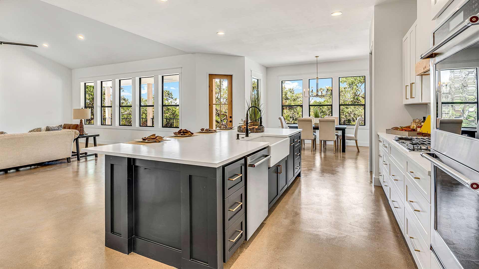 There is a large island in the middle of the kitchen.