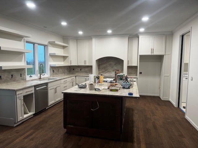 A black house with a lot of windows and doors