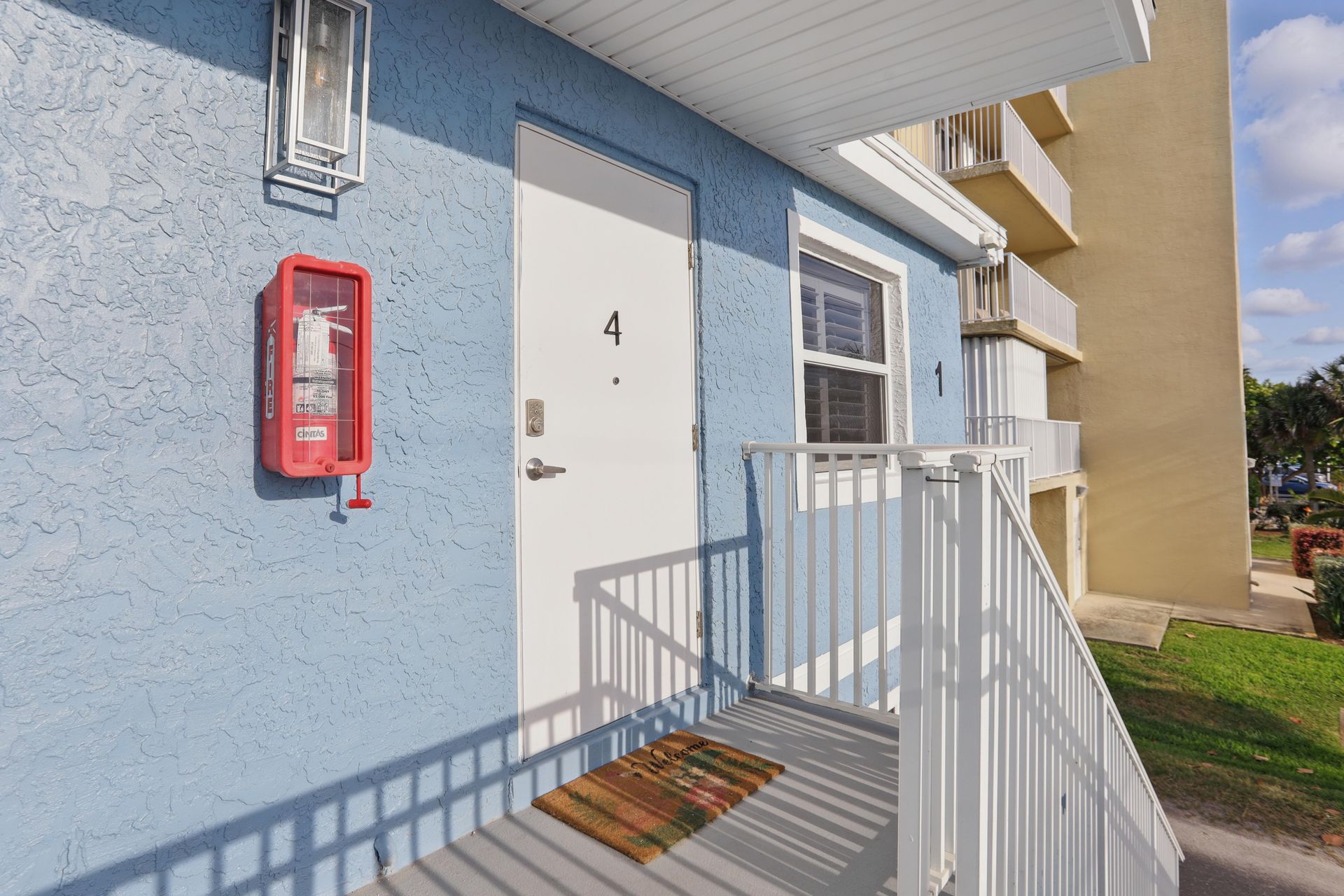 A blue building with the number 4 on the door