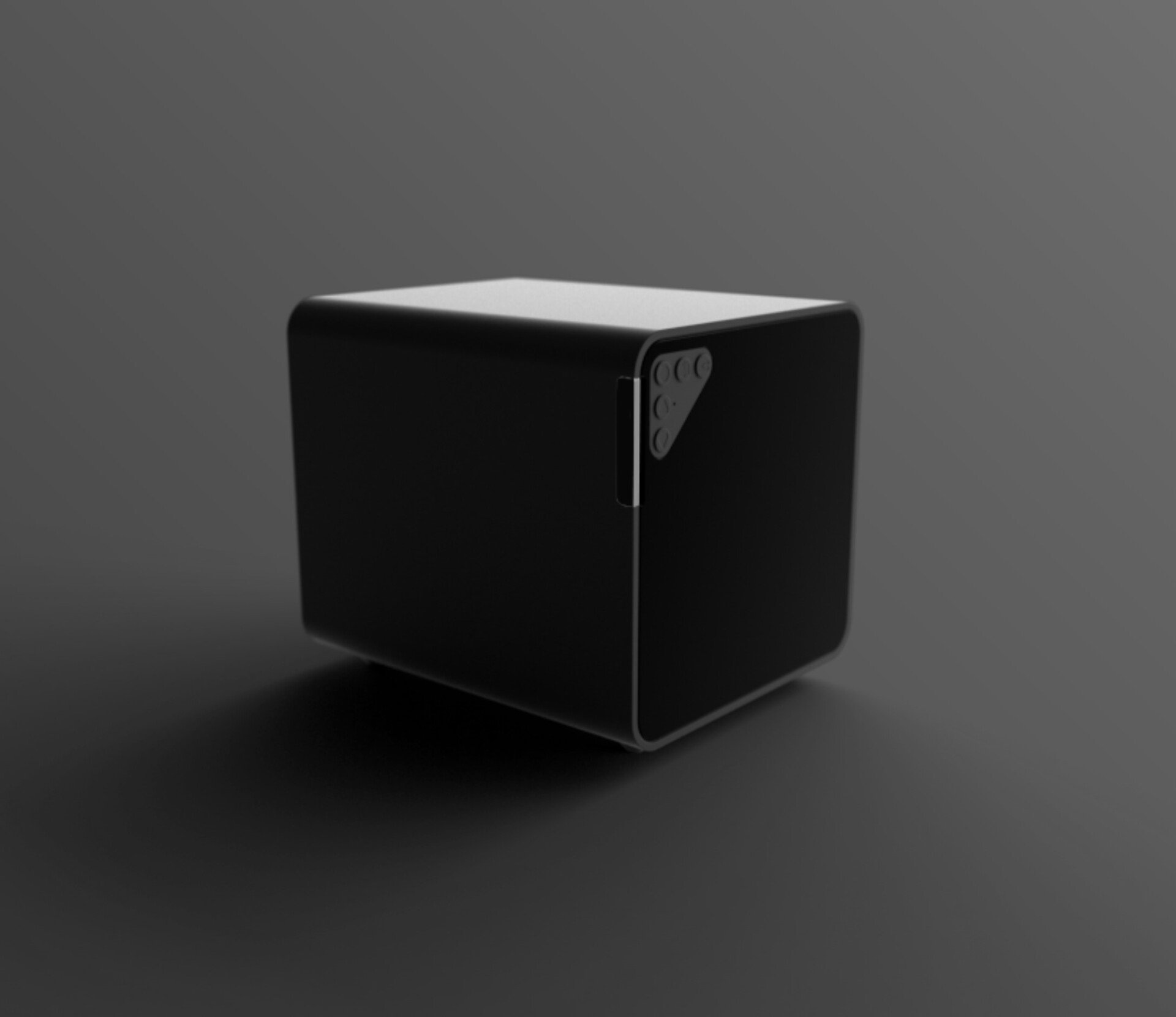 A black cube is sitting on a black surface.