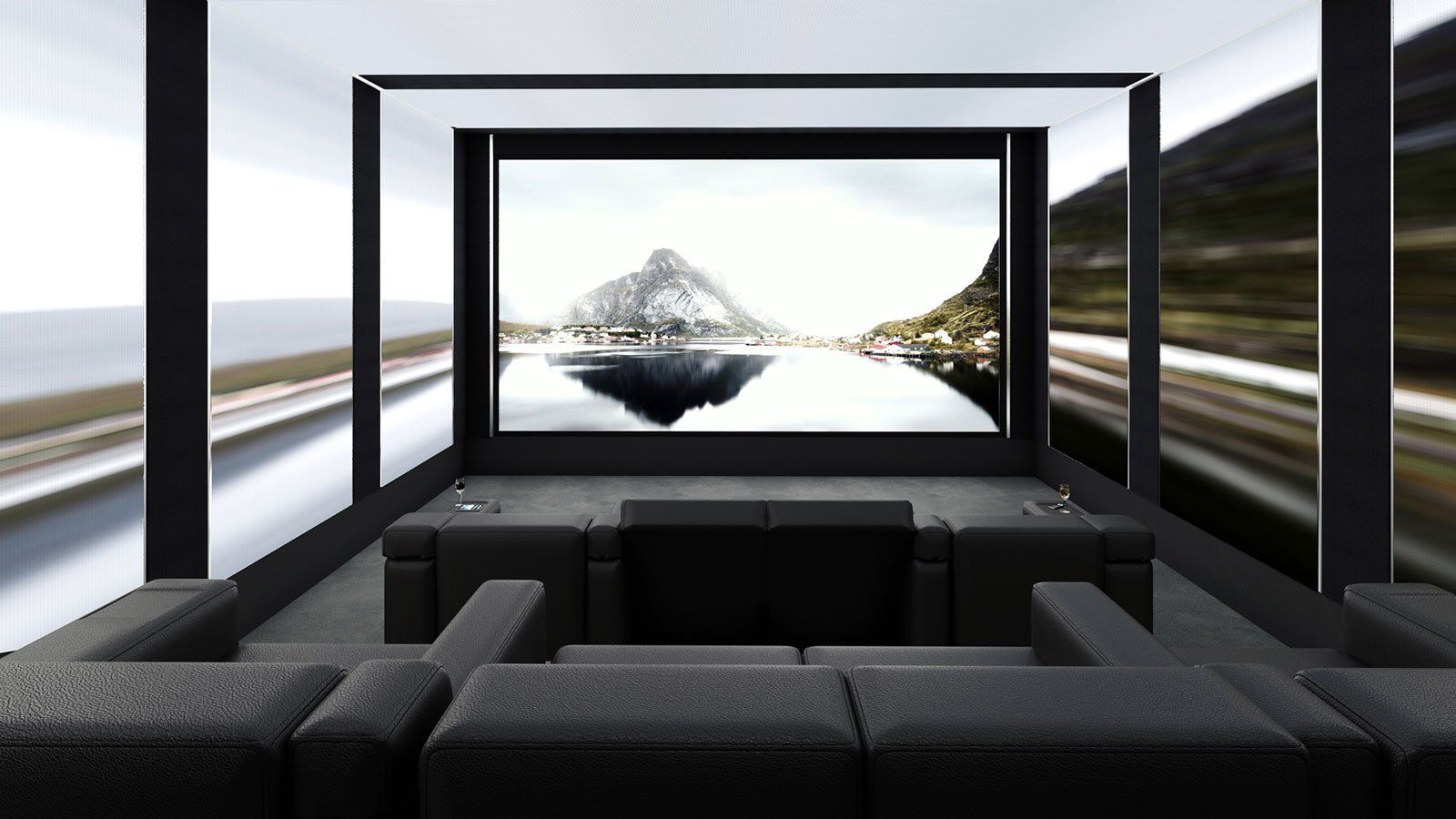 A living room with a couch and a large screen