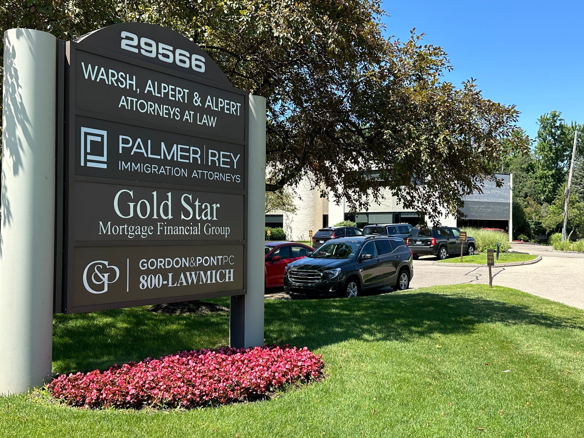 A sign that says gold star is in front of a building.